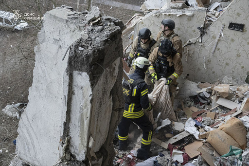 A drone attack by Russia targets an apartment complex in Ukraine, resulting in a minimum of 6 fatalities.