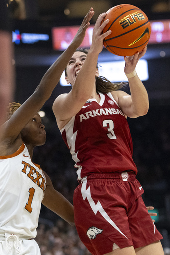 No. 5 Texas triumphs 90-56 against Arkansas with Moore’s 17 points and 14 rebounds