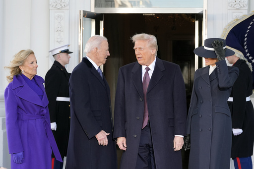 President-elect Donald Trump and Melania Trump are greeted by President Joe Biden and first lady Jill Biden, upon their arrival at the White House, Monday, Jan. 20, 2025, in Washington. (AP Photo/Alex Brandon)