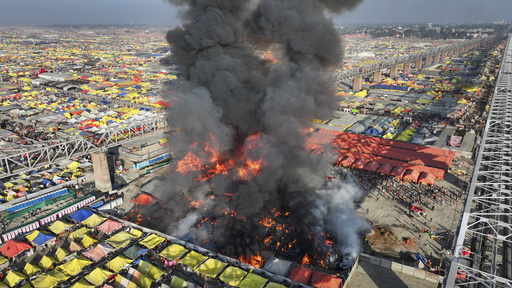 Blaze engulfs tents at India’s large Hindu celebration, but no injuries reported.