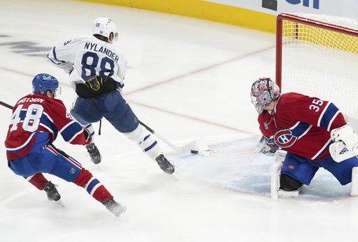 Maple Leafs rally with 7 straight goals to overcome 3-goal deficit and thump Canadiens 7-3.