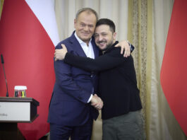 In this photo provided by the Ukrainian Presidential Press Office, Ukrainian President Volodymyr Zelenskyy, right, shakes hands with Polish Prime Minister Donald Tusk in Lviv, Ukraine, Tuesday, Dec. 17, 2024. (Ukrainian Presidential Press Office via AP)