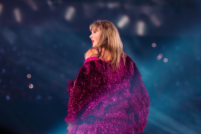 VANCOUVER, BRITISH COLUMBIA - DECEMBER 08: EDITORIAL USE ONLY. NO STANDALONE PUBLICATION USE (NO SPECIAL INTEREST OR SINGLE ARTIST PUBLICATION USE; NO BOOK USE). Taylor Swift performs onstage during 