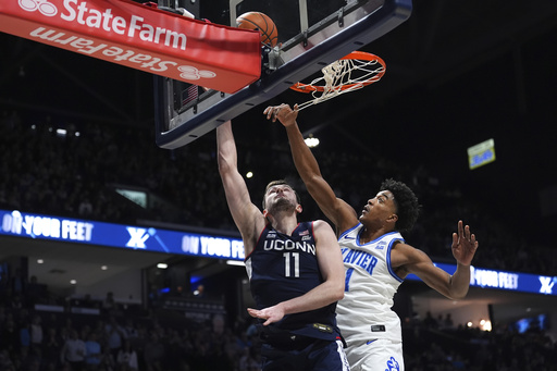 Xavier tops No. 19 UConn 76-72 with Swain and Freemantle contributing 15 points each