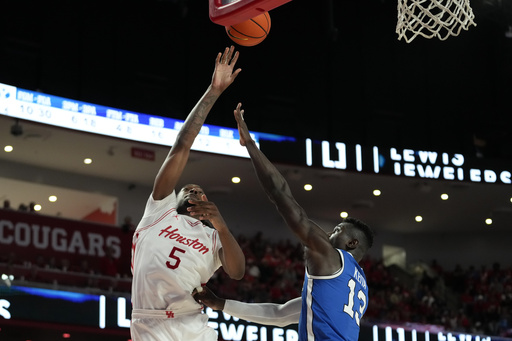 Emanuel Sharp leads No. 14 Houston to an 86-55 victory against BYU with 18 points.