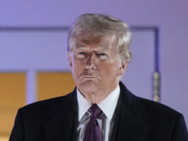 President-elect Donald Trump watches fireworks at Trump National Golf Club in Sterling, Va., Saturday, Jan. 18, 2025, ahead of the 60th Presidential Inauguration. (AP Photo/Matt Rourke)