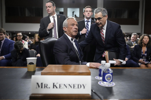 Robert F. Kennedy Jr., President Donald Trump's choice to be Secretary of Health and Human Services, arrives to appear before the Senate Finance Committee for his confirmation hearing, at the Capitol in Washington, Wednesday, Jan. 29, 2025. (AP Photo/Ben Curtis)