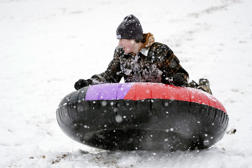 Southern states experience an uncommon snow day due to winter storm.