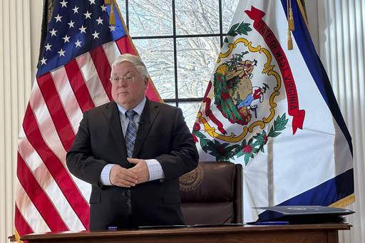 West Virginia’s governor removes DEI initiatives and implements vaccine exemptions on his initial day in office