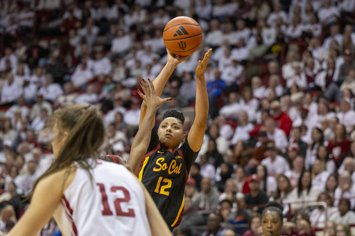 JuJu Watkins shines in the final moments as No. 4 USC defeats Indiana 73-66, securing their 13th consecutive victory.