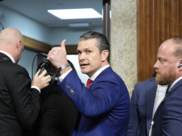 Pete Hegseth, President-elect Donald Trump's choice to be Defense secretary, gives a thumbs up while leaving after his Senate Armed Services Committee confirmation hearing, at the Capitol in Washington, Tuesday, Jan. 14, 2025. (AP Photo/Alex Brandon)