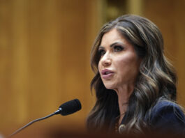 South Dakota Gov. Kristi Noem, President-elect Donald Trump's nominee to be Secretary of Homeland Security, appears before the Senate Homeland Security and Governmental Affairs Committee for her confirmation hearing, at the Capitol in Washington, Friday, Jan. 17, 2025. (AP Photo/Susan Walsh)