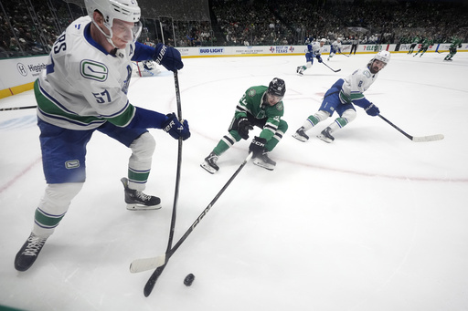 Jason Robertson and Roope Hintz each score twice and add an assist in Stars’ 5-3 victory against Canucks.