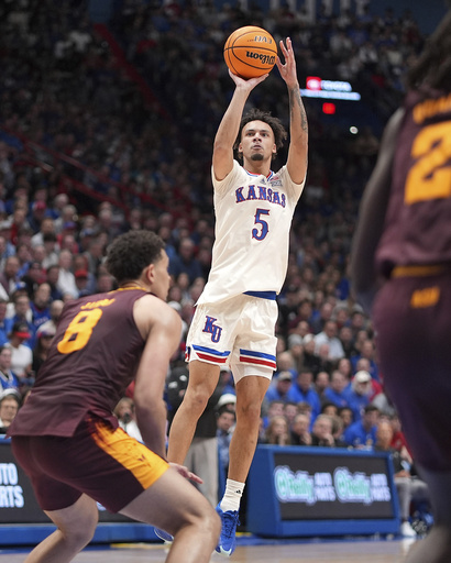 Kansas, ranked 11th, dominates Arizona State in second half for 74-55 victory.