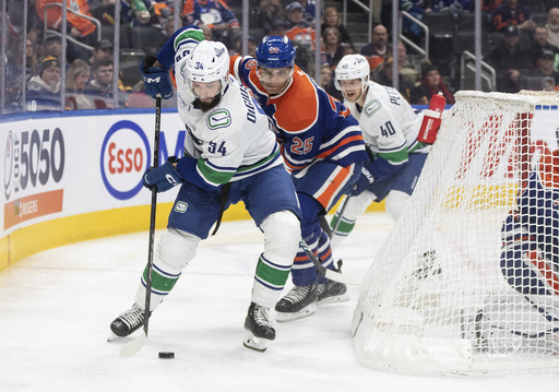 Zach Hyman scores twice and records an assist in Oilers’ 6-2 victory against the Canucks.