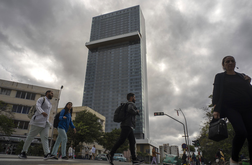 A luxurious hotel rises above Havana amidst escalating economic challenges and a decline in tourism in Cuba.