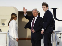 President-elect Donald Trump, standing with Melania and Barron Trump, waves as they board an Air Force Special Mission airplane at Palm Beach International Airport Saturday, Jan. 18, 2025 in West Palm Beach, Fla., enroute to Washington. (AP Photo/Lynne Sladky)(AP Photo/Lynne Sladky)