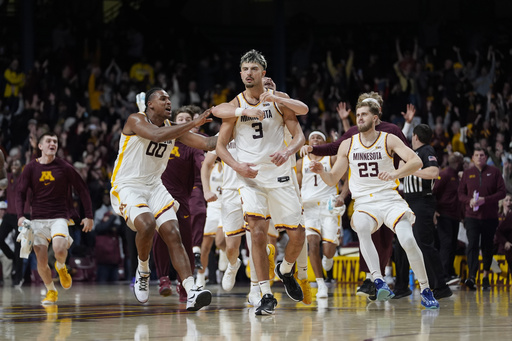 Dawson Garcia sinks logo-range three to propel Minnesota over No. 20 Michigan in overtime.