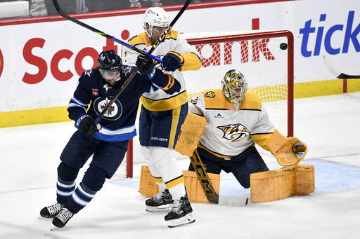 Connor Hellebuyck achieves milestone 300th victory while Jets defeat Predators 5-2