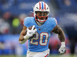 NASHVILLE, TENNESSEE - JANUARY 5: Tony Pollard #20 of the Tennessee Titans runs the ball during a game against the Houston Texans at Nissan Stadium on January 5, 2025 in Nashville, Tennessee. The Texans defeated the Titans 23-14. (Photo by Wesley Hitt/Getty Images)