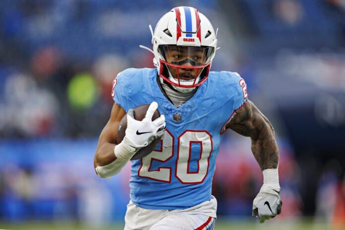 NASHVILLE, TENNESSEE - JANUARY 5: Tony Pollard #20 of the Tennessee Titans runs the ball during a game against the Houston Texans at Nissan Stadium on January 5, 2025 in Nashville, Tennessee. The Texans defeated the Titans 23-14. (Photo by Wesley Hitt/Getty Images)