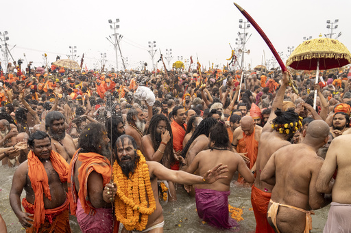 Millions of devotees and bare, ash-covered ascetics bathe in sacred waters during India’s grand Hindu celebration