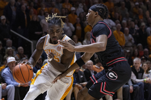 No. 6 Tennessee rallies from a sluggish beginning to defeat No. 23 Georgia 74-56 in SEC clash