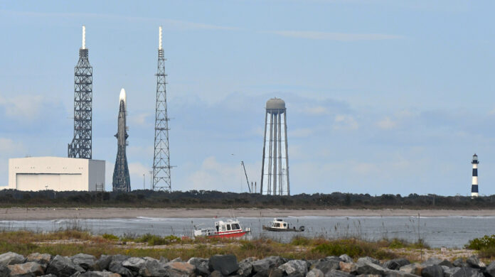 CAPE CANAVERAL, FLORIDA, UNITED STATES - JANUARY 11: Patrol boats are seen near Blue Origin's New Glenn rocket as it stands at pad 36 at Cape Canaveral Space Force Station ahead of its maiden launch on January 11, 2025 in Cape Canaveral, Florida. After several delays, launch is currently scheduled for January 13. The 321-foot-tall rocket will launch Blue Origin's Blue Ring spacecraft, which is designed to host and deploy multiple payloads. (Photo by Paul Hennessy/Anadolu via Getty Images)