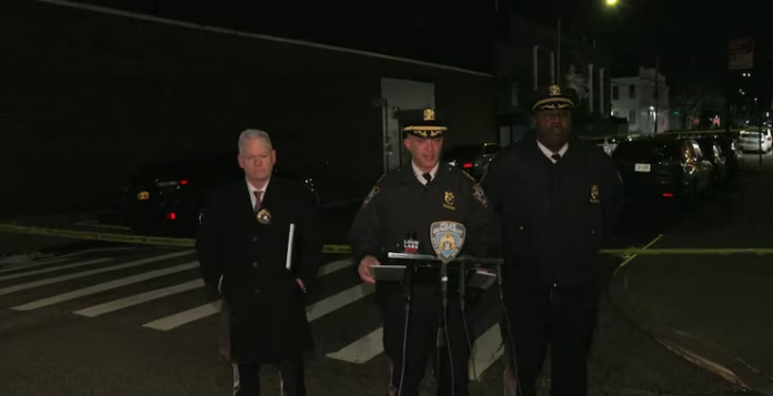 Members of the New York Police Department discuss a shooting in Queens, New York, at a press conference on Jan. 2, 2025.