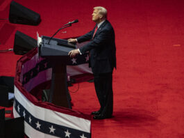 WASHINGTON, DC - JANUARY 19: President-Elect Donald Trump watches an immigration video at his victory rally at the Capital One Arena on January 19, 2025 in Washington, DC. Trump will be sworn in as the 47th U.S. president on January 20.(Photo by Kevin Carter/Getty Images)