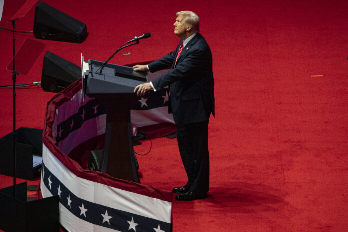 WASHINGTON, DC - JANUARY 19: President-Elect Donald Trump watches an immigration video at his victory rally at the Capital One Arena on January 19, 2025 in Washington, DC. Trump will be sworn in as the 47th U.S. president on January 20.(Photo by Kevin Carter/Getty Images)