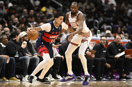 Devin Booker nets 37 points as Suns edge past Wizards 130-123 in thrilling contest.