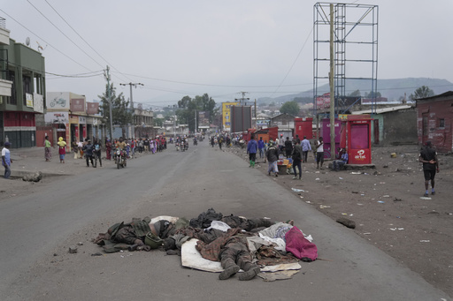 EDS NOTE: GRAPHIC CONTENT - Bodies of alleged members of the Armed Forces of the Democratic Republic of Congo (FARDC), who lost their lives fighting against M23 rebels lie on the street of Goma, Congo, Thursday, Jan. 30, 2025. (AP Photo/Brian Inganga)