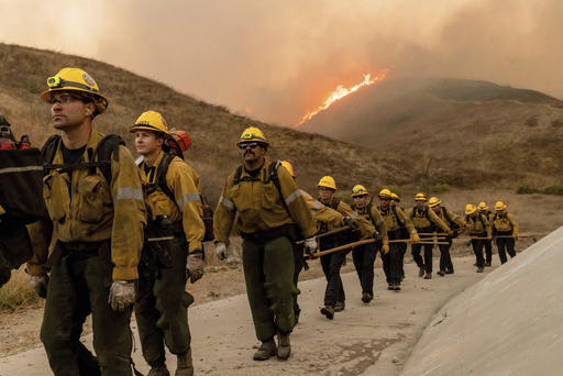 Recent wildfire near LA leads to additional evacuations as over 10,000 buildings destroyed by the two largest fires