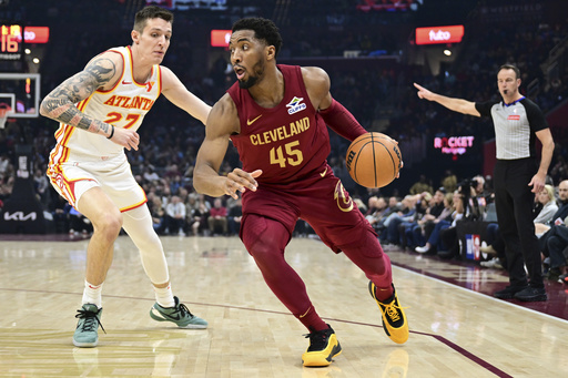 Cavaliers, led by All-Stars Darius Garland and Evan Mobley, triumph over Hawks 137-115 to maintain NBA’s top spot.