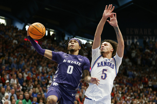 Dickinson leads with 25 points, Mayo adds 24 as No. 9 Kansas defeats Kansas State 84-74