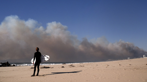 California’s governor reports that the Pacific Palisades wildfire has ravaged numerous buildings as winds intensify.