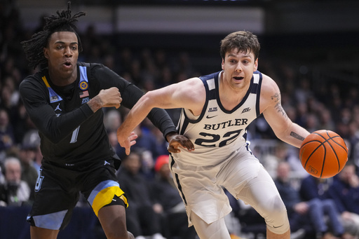 Stevie Mitchell shines in career-best performance as No. 9 Marquette triumphs over Butler 78-69 despite foul issues.