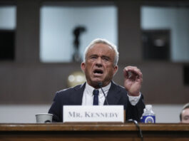 Robert F. Kennedy Jr., President Donald Trump's choice to be Secretary of Health and Human Services, appears before the Senate Finance Committee for his confirmation hearing, at the Capitol in Washington, Wednesday, Jan. 29, 2025. (AP Photo/Ben Curtis)