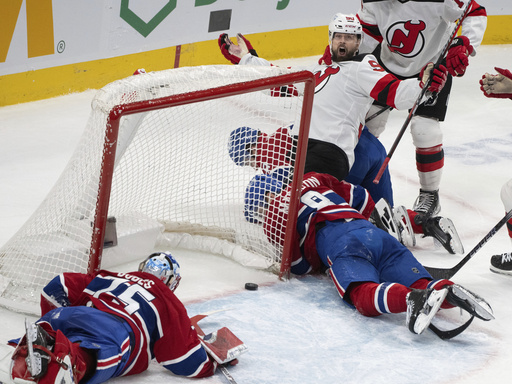 Jack Hughes nets overtime goal at 4:06, leading the Devils to a 4-3 victory against the Canadiens