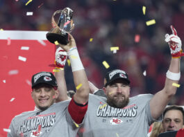 Kansas City Chiefs quarterback Patrick Mahomes, left, and tight end Travis Kelce celebrate after the Chiefs defeated the Buffalo Bills in the AFC Championship NFL football game, Sunday, Jan. 26, 2025, in Kansas City, Mo. (AP Photo/Ed Zurga)