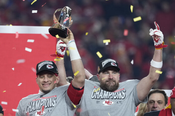 Kansas City Chiefs quarterback Patrick Mahomes, left, and tight end Travis Kelce celebrate after the Chiefs defeated the Buffalo Bills in the AFC Championship NFL football game, Sunday, Jan. 26, 2025, in Kansas City, Mo. (AP Photo/Ed Zurga)