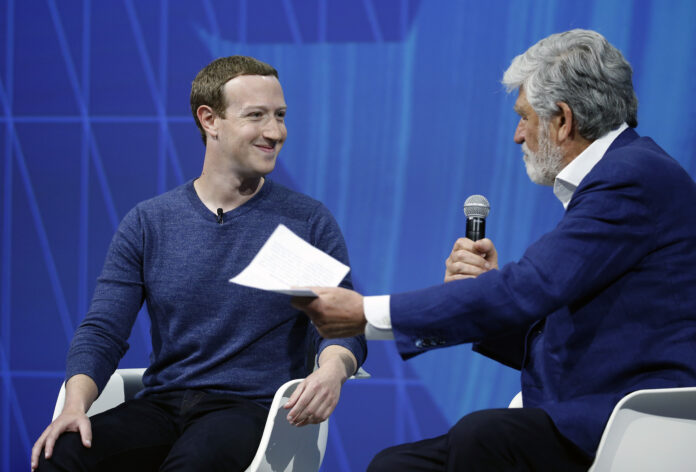 PARIS, FRANCE - MAY 24: Facebook founder and CEO Mark Zuckerberg answers Co-founder of Viva Technology Maurice Levy 's questions during the Viva Technologie show at Parc des Expositions Porte de Versailles on May 24, 2018 in Paris, France. Viva Technology, the new international event brings together 5,000 startups with top investors, companies to grow businesses and all players in the digital transformation who shape the future of the internet. (Photo by Chesnot/Getty Images)