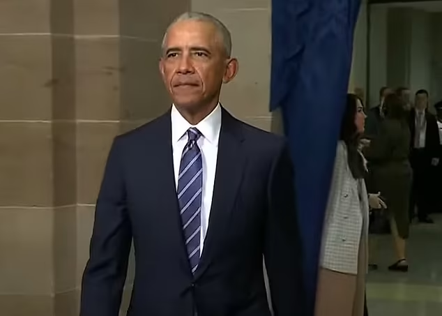 He entered the Rotunda on his own - where Trump's inauguration was moved due to bitterly cold weather and snow flurries

