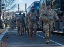 Washington, DC – January 19, 2021: Armed National Guardsmen on security detail at the U.S. Capitol