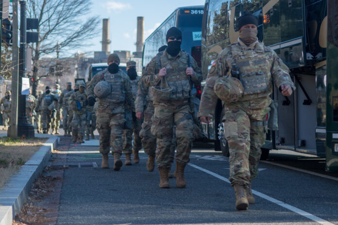 Washington, DC – January 19, 2021: Armed National Guardsmen on security detail at the U.S. Capitol