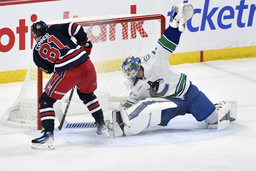 Kyle Connor scores hat trick in first period, leading Jets to 6-1 victory against Canucks