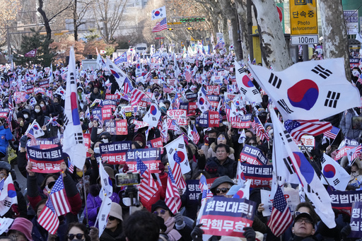 Supporters of impeached South Korean President Yoon Suk Yeol stage a rally to oppose his impeachment near the Constitutional Court in Seoul, South Korea, Thursday, Jan. 23, 2025. (AP Photo/Ahn Young-joon)