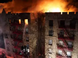 Nearly 200 New York firefighters are battling a massive five-alarm blaze at a Bronx apartment building Friday morning that has left at least seven people injured. Christopher Sadowski