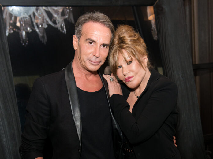 NEW YORK, NY - AUGUST 05: (L-R) Lloyd Klein and Jocelyn Wildenstein pose for a photo at Baccarat Hotel on August 5, 2017 in New York City. (Photo by Noam Galai/Getty Images)